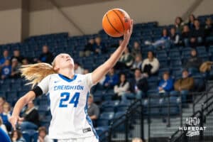 Creighton Bluejay Ava Zediker (24) shoots a layup during a basketball game against Tulsa on Sunday, Dec 7, 2025, in Omaha, Nebraska. Photo by Brandon Tiedemann.