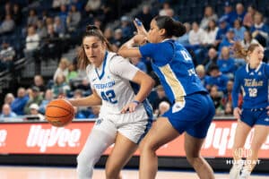 Creighton Bluejay Grace Boffeli (42) backs down her defender during a basketball game against Tulsa on Sunday, Dec 7, 2025, in Omaha, Nebraska. Photo by Brandon Tiedemann.