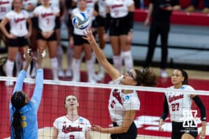 Nebraska Cornhusker middle blocker Rebekah Allick (5) tries to reach the ball to tip it against the LIU Sharks in the second set during the first round of the NCAA volleyball tournament on Friday, Dec. 5, 2025, in Lincoln, Nebraska. Photo by John S. Peterson.