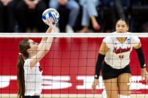 Nebraska Cornhusker setter Bergen Reilly (2) sets the ball against the LIU Sharks during the first round of the NCAA volleyball tournament on Friday, Dec. 5, 2025, in Lincoln, Nebraska. Photo by John S. Peterson.