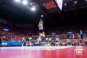 Nebraska Cornhusker middle blocker Andi Jackson (15) serves the ball against the LIU Sharks in the first set during the first round of the NCAA volleyball tournament on Friday, Dec. 5, 2025, in Lincoln, Nebraska. Photo by John S. Peterson.