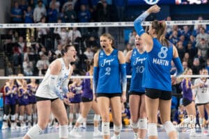 Creighton Bluejays cheer after a crucial point during a volleyball match game against Northern Iowa on Thursday, Dec 5, 2025, in Omaha, Nebraska. Photo by Brandon Tiedemann.