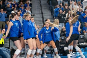 Creighton Bluejays bench cheer after a point during a volleyball match game against Northern Iowa on Thursday, Dec 5, 2025, in Omaha, Nebraska. Photo by Brandon Tiedemann.