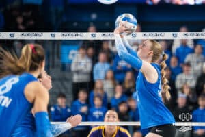 Creighton Bluejay Annalea Maeder (17) sets the ball during a volleyball match game against Northern Iowa on Thursday, Dec 5, 2025, in Omaha, Nebraska. Photo by Brandon Tiedemann.