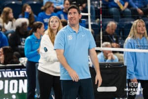 Creighton Bluejay head coach Brian Rosen helps the team warmup before a volleyball match game against Northern Iowa on Thursday, Dec 5, 2025, in Omaha, Nebraska. Photo by Brandon Tiedemann.