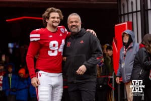 Nebraska Cornhusker long snapper Aidan Flege (94) poses for a photo with head coach Matt Rhule for senior day before a college football game against the Iowa Hawkeyes on Friday, Nov. 28, 2025, in Lincoln, Nebraska. Photo by John S. Peterson.