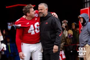 Nebraska Cornhusker long snapper Kevin Gallic (46) poses for a photo with head coach Matt Rhule for senior day before a college football game against the Iowa Hawkeyes on Friday, Nov. 28, 2025, in Lincoln, Nebraska. Photo by John S. Peterson.