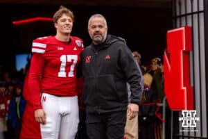 Nebraska Cornhusker quarterback Luke Longval (17) poses for a photo with head coach Matt Rhule for senior day before a college football game against the Iowa Hawkeyes on Friday, Nov. 28, 2025, in Lincoln, Nebraska. Photo by John S. Peterson.