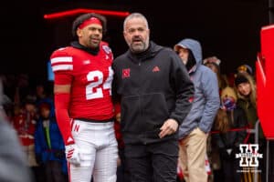 Nebraska Cornhusker defensive back Derek Branch (24) poses for a photo with head coach Matt Rhule for senior day before a college football game against the Iowa Hawkeyes on Friday, Nov. 28, 2025, in Lincoln, Nebraska. Photo by John S. Peterson.