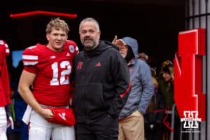 Nebraska Cornhusker quarterback Jalyn Gramstad (12) poses for a photo with head coach Matt Rhule for senior day before a college football game against the Iowa Hawkeyes on Friday, Nov. 28, 2025, in Lincoln, Nebraska. Photo by John S. Peterson.