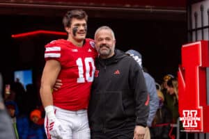 Nebraska Cornhusker tight end Heinrich Haarberg (10) poses for a photo with head coach Matt Rhule for senior day before a college football game against the Iowa Hawkeyes on Friday, Nov. 28, 2025, in Lincoln, Nebraska. Photo by John S. Peterson.
