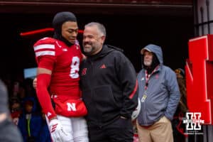 Nebraska Cornhusker defensive back Deshon Singleton (8) poses for a photo with head coach Matt Rhule for senior day before a college football game against the Iowa Hawkeyes on Friday, Nov. 28, 2025, in Lincoln, Nebraska. Photo by John S. Peterson.