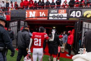 Nebraska Cornhusker running back Emmett Johnson (21) waves to the fans as he walks to the locker room after the loss to the Iowa Hawkeyes during a college football game on Friday, Nov. 28, 2025, in Lincoln, Nebraska. Photo by John S. Peterson.
