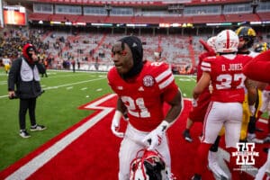Nebraska Cornhusker running back Emmett Johnson (21) walking around shaking hands with the Iowa Hawkeyes after a college football game on Friday, Nov. 28, 2025, in Lincoln, Nebraska. Photo by John S. Peterson.