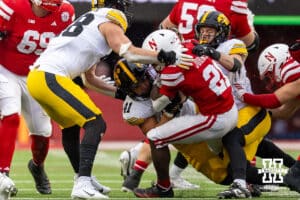 Nebraska Cornhusker running back Emmett Johnson (21) runs with the ball against the Iowa Hawkeyes during a college football game on Friday, Nov. 28, 2025, in Lincoln, Nebraska. Photo by John S. Peterson.