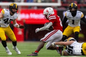 Nebraska Cornhusker running back Emmett Johnson (21) runs with the ball against the Iowa Hawkeyes during a college football game on Friday, Nov. 28, 2025, in Lincoln, Nebraska. Photo by John S. Peterson.