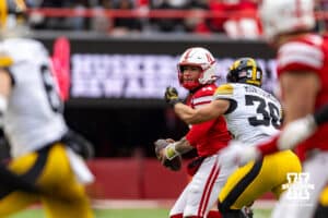 Nebraska Cornhusker quarterback TJ Lateef (14) drops back to pass against the Iowa Hawkeyes during a college football game on Friday, Nov. 28, 2025, in Lincoln, Nebraska. Photo by John S. Peterson.