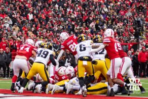 Nebraska Cornhusker running back Emmett Johnson (21) dives for a touchdown against the Iowa Hawkeyes in the first quarter during a college football game on Friday, Nov. 28, 2025, in Lincoln, Nebraska. Photo by John S. Peterson.