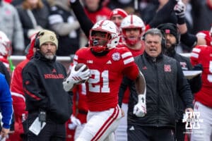 Nebraska Cornhusker running back Emmett Johnson (21) runs with the ball against the Iowa Hawkeyes in the first quarter during a college football game on Friday, Nov. 28, 2025, in Lincoln, Nebraska. Photo by John S. Peterson.
