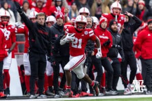 Nebraska Cornhusker running back Emmett Johnson (21) runs with the ball against the Iowa Hawkeyes in the first quarter during a college football game on Friday, Nov. 28, 2025, in Lincoln, Nebraska. Photo by John S. Peterson.