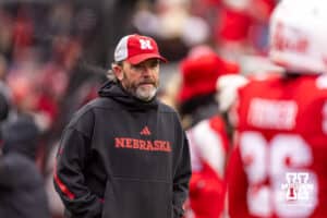 Nebraska Cornhuskers defensive coordinator John Butler watching warm ups before taking on the Iowa Hawkeyes during a college football game on Friday, Nov. 28, 2025, in Lincoln, Nebraska. Photo by John S. Peterson.