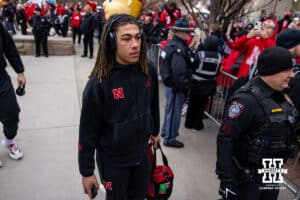 Nebraska Cornhusker quarterback TJ Lateef (14) walks to the stadium to take on the Iowa Hawkeyes during a college football game on Friday, Nov. 28, 2025, in Lincoln, Nebraska. Photo by John S. Peterson.