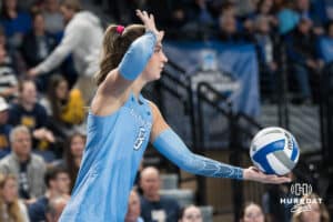 Creighton Bluejay Ava Martin (8) waits to serve during a volleyball match game against Northern Colorado on Thursday, Dec 4, 2025, in Omaha, Nebraska. Photo by Brandon Tiedemann.