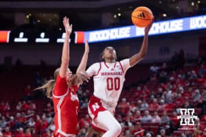 Nebraska Cornhusker guard Alanna Neale (00) makes a basket against Bradley Brave guard Lila Posthuma (3) in the fourth quarter during a college basketball game on Wednesday, Dec. 3, 2025, in Lincoln, Nebraska. Photo by John S. Peterson.