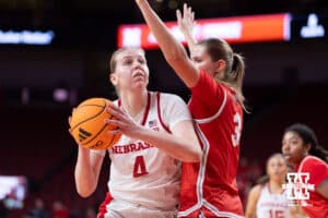 Nebraska Cornhusker forward Petra Bozan (4) makes a lay up against Bradley Brave guard Lila Posthuma (3) in the second half during a college basketball game on Wednesday, Dec. 3, 2025, in Lincoln, Nebraska. Photo by John S. Peterson.