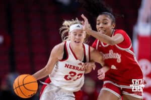Nebraska Cornhusker guard Britt Prince (23) drives to the basket against Nebraska Cornhusker forward Petra Bozan (4) in the second half during a college basketball game on Wednesday, Dec. 3, 2025, in Lincoln, Nebraska. Photo by John S. Peterson.