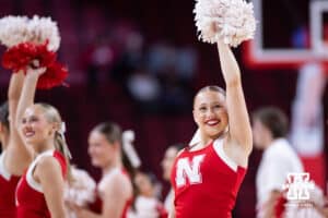Nebraska Cornhusker cheerleaders perform at a break in the action against the Bradley Braves during a college basketball game on Wednesday, Dec. 3, 2025, in Lincoln, Nebraska. Photo by John S. Peterson.
