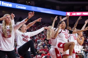 Nebraska Cornhuskers bench celebrates a three point shot against the Bradley Braves in the fourth quarter during a college basketball game on Wednesday, Dec. 3, 2025, in Lincoln, Nebraska. Photo by John S. Peterson.