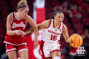 Nebraska Cornhusker guard Kennadi Williams (15) dribbles the ball down the court against Bradley Brave guard Mya Wardle (10) in th fourth quarter during a college basketball game on Wednesday, Dec. 3, 2025, in Lincoln, Nebraska. Photo by John S. Peterson.