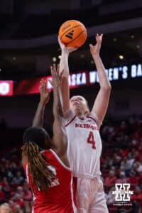 Nebraska Cornhusker forward Petra Bozan (4) makes a lay up against Bradley Brave forward Amy O'Hara (12) in the third quarter during a college basketball game on Wednesday, Dec. 3, 2025, in Lincoln, Nebraska. Photo by John S. Peterson.
