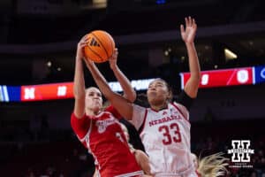 Nebraska Cornhusker forward Amiah Hargrove (33) reaches for a rebound against Bradley Brave guard Lila Posthuma (3) in the first half during a college basketball game on Wednesday, Dec. 3, 2025, in Lincoln, Nebraska. Photo by John S. Peterson.