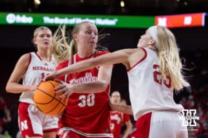Nebraska Cornhusker guard Britt Prince (23) blocks a lay up by Bradley Brave forward Carlie Vick (30) in the first quarter during a college basketball game on Wednesday, Dec. 3, 2025, in Lincoln, Nebraska. Photo by John S. Peterson.