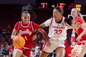 Nebraska Cornhusker forward Amiah Hargrove (33) defends against Bradley Brave guard Maya Foz (4) in the first quarter during a college basketball game on Wednesday, Dec. 3, 2025, in Lincoln, Nebraska. Photo by John S. Peterson.