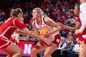 Nebraska Cornhusker forward Jessica Petrie (12) grabs the rebound against Bradley Brave guard Lila Posthuma (3) in the first quarter during a college basketball game on Wednesday, Dec. 3, 2025, in Lincoln, Nebraska. Photo by John S. Peterson.