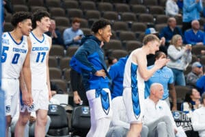 Creighton Bluejay Blake Harper (2) celebrates the Liam McChesney (13) dunk during a college basketball game against Nicholls on Tuesday, Dec 2, 2025, in Omaha, Nebraska. Photo by Brandon Tiedemann.