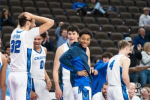 Creighton Bluejay bench celebrates Liam McChesney (13) dunk during a college basketball game against Nicholls on Tuesday, Dec 2, 2025, in Omaha, Nebraska. Photo by Brandon Tiedemann.