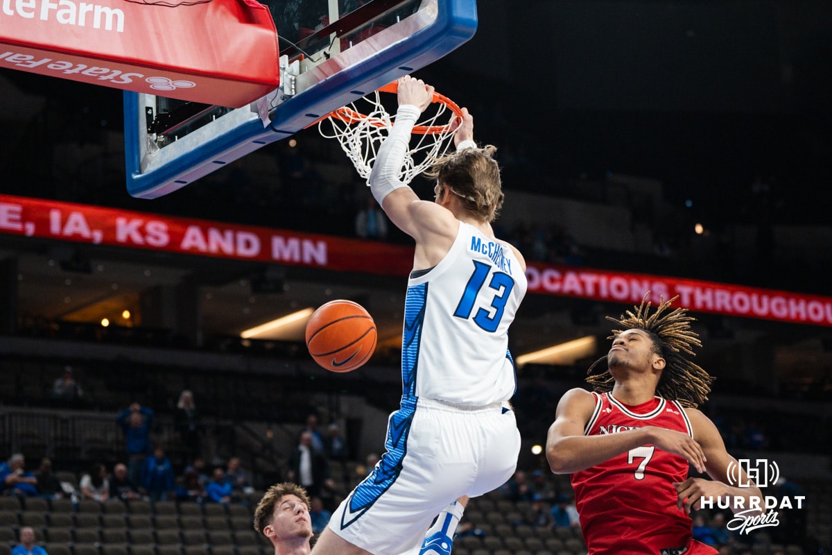 Creighton Bluejay Liam McChesney (13) dunks during a college basketball game against Nicholls on Tuesday, Dec 2, 2025, in Omaha, Nebraska. Photo by Brandon Tiedemann.