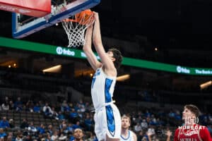 Creighton Bluejay Kerem Konan (17) dunks during a college basketball game against Nicholls on Tuesday, Dec 2, 2025, in Omaha, Nebraska. Photo by Brandon Tiedemann.