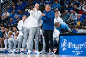 Creighton Bluejay coaches Greg McDermott and Alan Huss speak after a timeout during a college basketball game against Nicholls on Tuesday, Dec 2, 2025, in Omaha, Nebraska. Photo by Brandon Tiedemann.