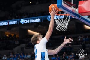 Creighton Bluejay Owen Freeman (32) goes up for a layup during a college basketball game against Nicholls on Tuesday, Dec 2, 2025, in Omaha, Nebraska. Photo by Brandon Tiedemann.