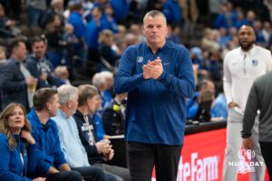 Creighton Bluejay head coach Greg McDermott walks toward the bench before a college basketball game against Nicholls on Tuesday, Dec 2, 2025, in Omaha, Nebraska. Photo by Brandon Tiedemann.