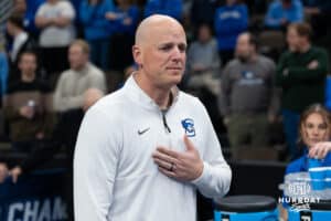 Creighton Bluejay associate coach Alan Huss walks onto the court before a college basketball game against Nicholls on Tuesday, Dec 2, 2025, in Omaha, Nebraska. Photo by Brandon Tiedemann.