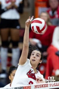 Nebraska Cornhusker opposite Virginia Adriano (9) spikes the ball against the Ohio State Buckeyes during a volleyball match on Saturday, Nov. 29, 2025, in Lincoln, Nebraska. Photo by John S. Peterson.