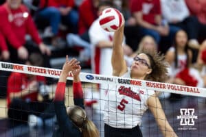 Nebraska Cornhusker middle blocker Rebekah Allick (5) spikes the ball against the Ohio State Buckeyes in the first set during a volleyball match on Saturday, Nov. 29, 2025, in Lincoln, Nebraska. Photo by John S. Peterson.
