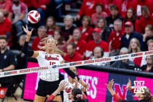 Nebraska Cornhusker middle blocker Andi Jackson (15) spikes the ball against the Ohio State Buckeyes in the first set during a volleyball match on Saturday, Nov. 29, 2025, in Lincoln, Nebraska. Photo by John S. Peterson.