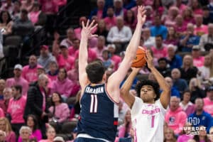 Creighton Bluejay Austin Swartz (1) shoots over Alex Karaban (11) during a college basketball game against UCONN on Jan 31, 2026, in Omaha, Nebraska. Photo by Brandon Tiedemann